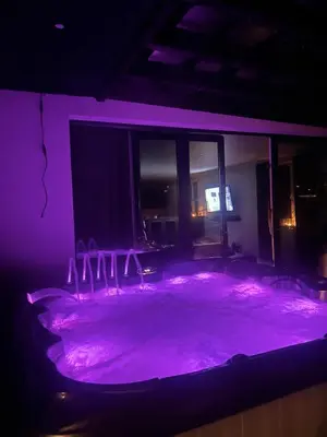 a stage with purple lights in a room at Holiday home Limanowa in Limanowa