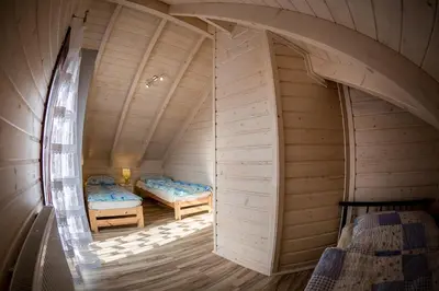 an inside view of a room with two beds at Na Dworosku in Golczowice