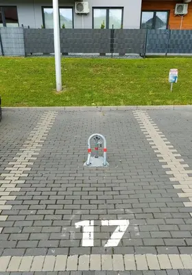 a white object sitting on a brick road at Apartament Korazone ZATOR in Zator