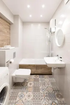 a bathroom with a sink and a toilet and a tub at Antique Apartments Old Town in Kraków