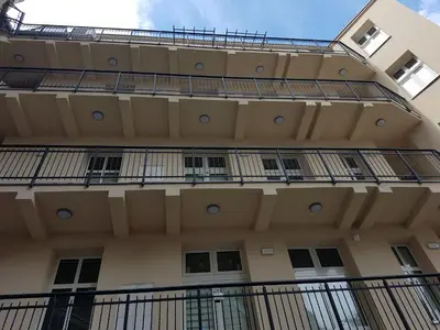 an external view of a building with balconies at Blue Apartment Old Town Air Condition p4you pl in Kraków