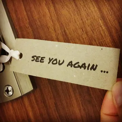 a piece of paper with the words see you again at Dream LUX Apartments in Kraków