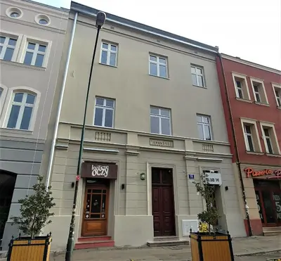 a building on the corner of a street at Studio Estery in Kraków
