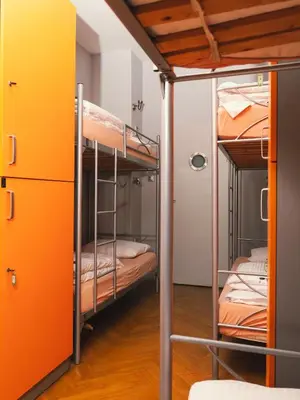 a room with bunk beds in a hostel at LazeMaze Hostel in Kraków
