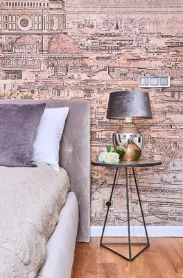 a bedroom with a bed and a table with a lamp at Chodkiewicza 10 (A) - cozy studio by Homeprime in Kraków