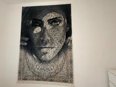 a picture of a bust of a woman on a wall at Apartament Solny Centrum Wieliczka 11 in Wieliczka