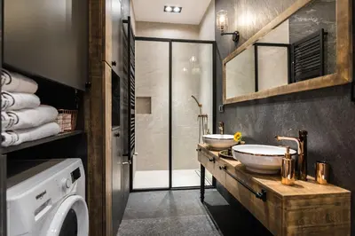 a bathroom with two sinks and a walk in shower at Wooden Horse - New Apartment - Old Town in Kraków