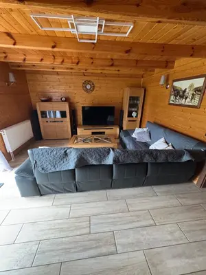 a blue picture with the words every guest who stayed with us helped us earn this at Beskid House Kurów in Kurów