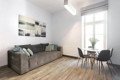 a living room with a couch and a table at Luxury Apartments Old Town Topolowa in Kraków