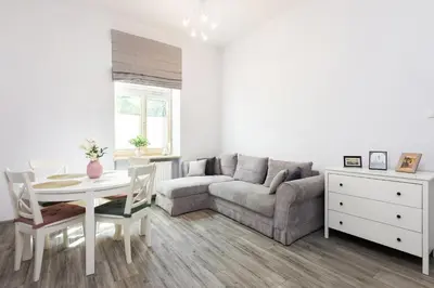 a living room with a couch and a table at Luxury Apartments Old Town Topolowa in Kraków