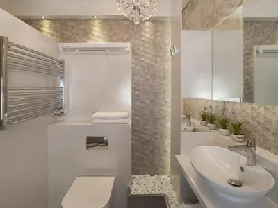 a white bathroom with a sink and a toilet at Parkside Apartments Old Town in Kraków