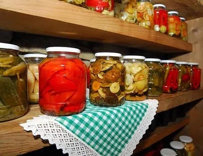 a shelf with jars of pickles on a table at Krakowiacy i Górale in Krzyszkowice