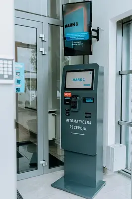 an atm machine in front of a building at Mark1 in Brzesko