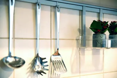 two utensils are hanging on a kitchen wall at Large and cozy Apartment 60 m2, Cracow Old Town in Kraków