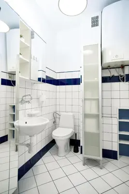 a bathroom with a toilet and a sink at Large and cozy Apartment 60 m2, Cracow Old Town in Kraków