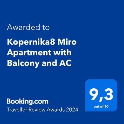 a screenshot of a phone with the text awarded to kyrka mic agreement at Kopernika8 Miro Apartment with Balcony and AC in Kraków