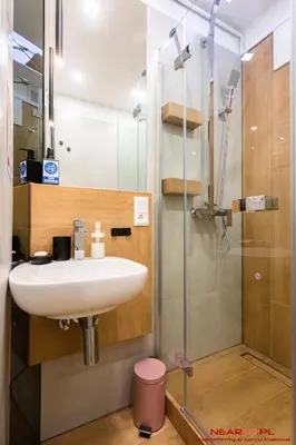 a bathroom with a sink and a shower at Apartment Nearto Old Town Daszyńskiego street in Kraków