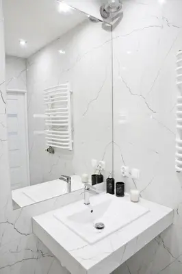 a white bathroom with a sink and a tub at Elegant City Center Apartment Pawlikowskiego 8 in Kraków