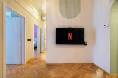 a view of a wall with a tv on a wall at Central Apartments Warszawska Street in Kraków