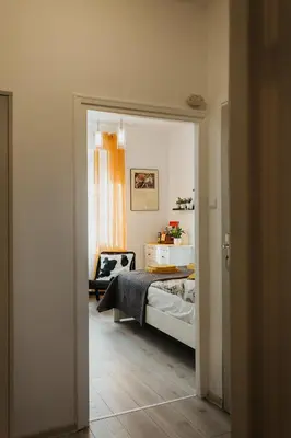a bedroom with a bed and a window at Charming apt Old Town & Jewish District, quiet neighborhood in Kraków