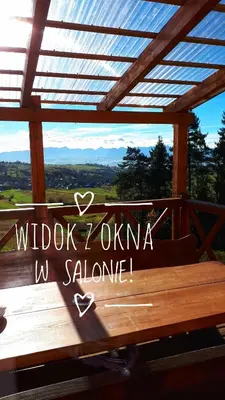 a wooden bench with the words wildlife zoya u salaho at Domek w Górach Prywatna Sauna i Balia in Klikuszowa