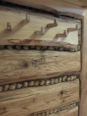 a wooden box with a bunch of logs on it at Chata Mioduszyna w Beskidach - drewniany dom z widokiem na Babią Górę in Maków Podhalański