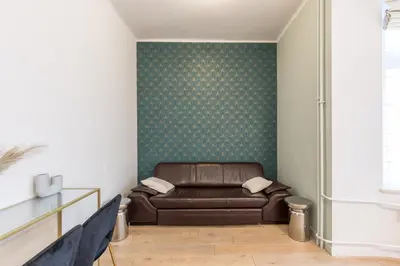 a bedroom with a large bed with two night stands at Luksusowy apartament Świętego Jana na Rynku in Kraków