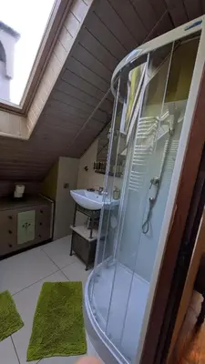 a bathroom with a shower and a sink at Agroturystyka SPA in Zelków