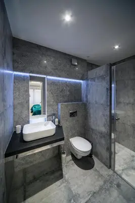 a bathroom with a sink and a toilet at KP Claudia in Wieliczka