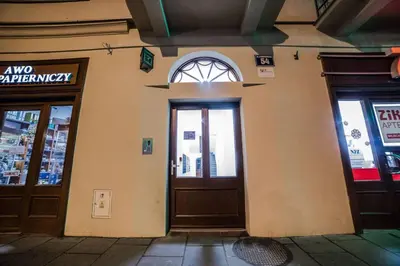 an entrance to a building with two entry doors at CracWoW Apartment in Kraków