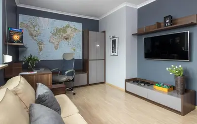 a living room with a couch and a map on the wall at Prywatna Rezydencja Marylin Monroe Rabka in Rabka