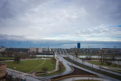 a view of a city with a bridge and a street at Nowe Zabłocie in Kraków