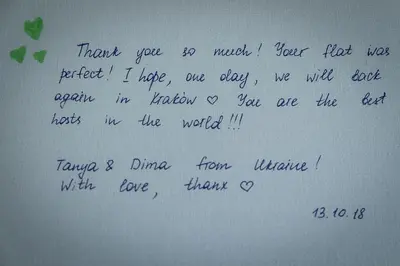 a writing on the side of a whiteboard at Apartament Turkusowy - Kraków, Kazimierz in Kraków