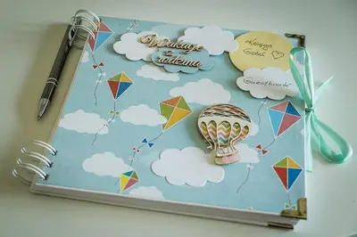 a bulletin board with kites flying in the sky at Apartament Turkusowy - Kraków, Kazimierz in Kraków