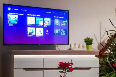 a flat screen tv sitting on top of a tv stand at Mogilska Tower + garaż in Kraków
