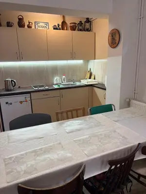 a living room with a couch and a table at KAJA Zawoja in Zawoja