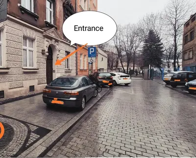 an image of a car parked on a city street at Tenczyńska 4 by Homeprime in Kraków