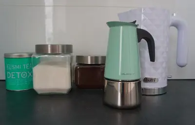 a blender sitting on top of a counter with some food at Lovely Bubbly Apartment in Kraków