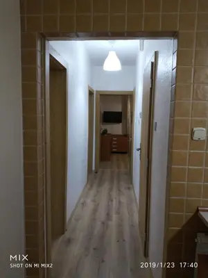 a hallway with a hallway leading to a room at Apartament Sofia Agroturystyka in Ryczów