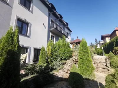 a house with a garden in front of it at Willa Cicha in Rabka