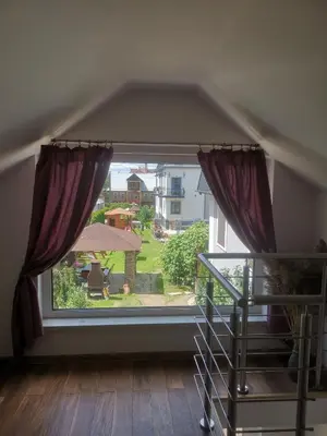 a window with a view of a yard at Willa Cicha in Rabka