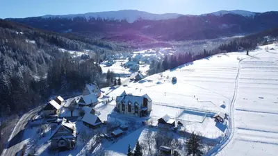 an aerial view of a ski resort in the snow at Dom Wypoczynkowy Modrys in Zawoja