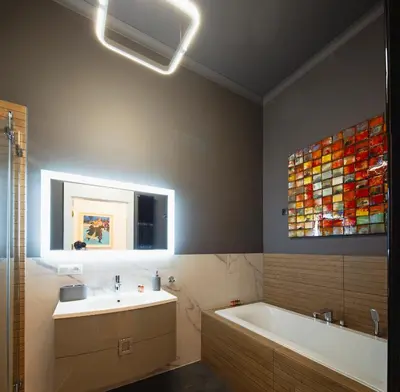 a bathroom with a bath tub and a sink at TCF Home - Big Apartment with Free Garage in Kraków