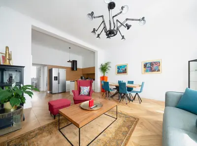 a living room with a couch and a table at TCF Home - Big Apartment with Free Garage in Kraków