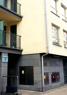 a building with a drainpipe in front of it at Friedleina 7 Kamienica Prezydencka in Kraków