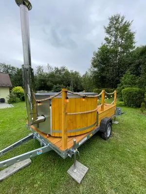 a boat on a trailer in a yard at Agroturystyka 