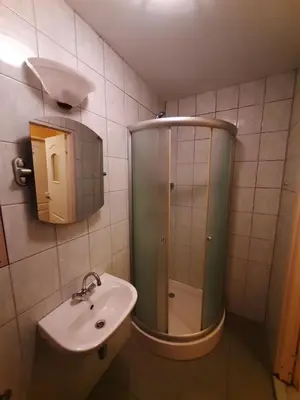 a bathroom with a sink and a shower at CKS Kraków (Centrum Konferencyjno-Szkoleniowe CS Natura Tour) in Kraków