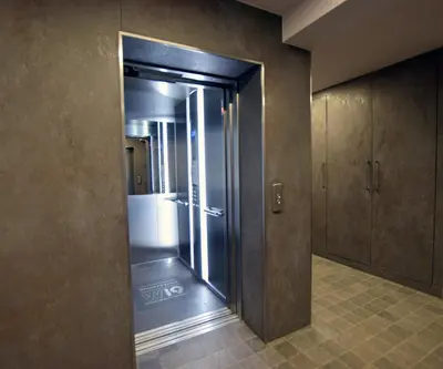 a bathroom with a glass door to a shower at Jewish Quarter Comfort - In City Apartments in Kraków