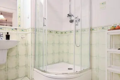a bathroom with a shower and a sink at D&A Apartments Szewska in Kraków