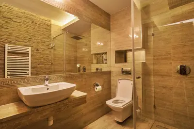 a bathroom with a sink and a toilet at Hotel Tatarscy - ENERGYLANDIA in Kalwaria Zebrzydowska